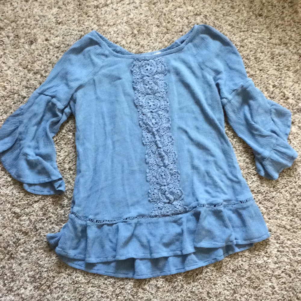 Elegant lacy blue blouse